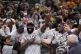 Boston Celtics guard Jaylen Brown (centre) celebrates with h