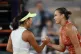 Aryna Sabalenka of Belarus (right) and Japan's Moyuka Uchiji