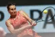 Aryna Sabalenka of Belarus plays a shot against Emma Navarro