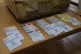 Voting cards sit on a desk in a voting station, June 9, 2024