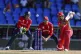 Oman's Shoaib Khan plays a shot as England's wicket keeper J