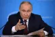 Russian President Vladimir Putin speaks during a meeting at 