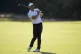 Rory McIlroy, of Northern Ireland, hits from the fairway on 