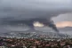 Smoke rises during protests in Noumea, New Caledonia, May 15