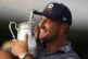 Bryson DeChambeau holds the trophy after winning the U.S. Op