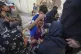 Palestinians mourn their relatives killed in the Israeli bom