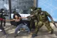 Police officers arrest a demonstrator protesting against pro