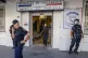 Police wait for the arrival of French President Emmanuel Mac