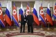 Russian President Vladimir Putin (left) and North Korea's le