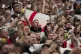 An England fan holds a flag before a Group C match between D
