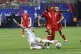 Argentina midfielder Leandro Paredes (5) slide-tackles Canad