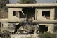 Israeli forces remove a body of a man killed during an Israe