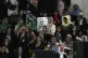 A supporter holds of a portrait of presidential election's c