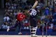 England's Chris Jordan (left) celebrates after getting a hat