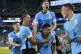 Uruguay's Maximiliano Araujo (bottom centre) celebrates with