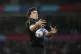 New Zealand's Scott Barrett takes the ball in a line out dur