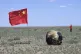 In this photo released by Xinhua News Agency, the return cap