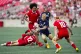 Scotland's Arron Reed (11) runs the ball as Canada's Peter N