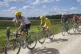 Slovenia's Tadej Pogacar, wearing the overall leader's yello