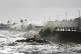 Waves break over Sea Point's promenade in Cape Town, South A