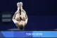 Quan Hongchan of China competes in women's diving 10-metre p
