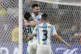 Argentina's Lionel Messi is congratulated after scoring his 