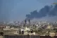 Smoke rises following an Israeli airstrike in the central Ga