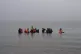 A group of Kurdish people on the beach of Ambleteuse, northe