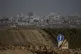 Destroyed buildings stand in the Gaza Strip, July 14, 2024