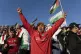 Club Palestino soccer team fans celebrate their second goal 