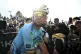 Mark Cavendish crosses the finish line after the 20th stage 