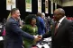 South African President Cyril Ramaphosa (right) greets oppos