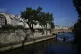 A man walks along the Seine river at the 2024 Summer Olympic