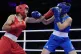 Algeria's Imane Khelif (left) fights Italy's Angela Carini i