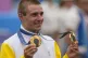 Remco Evenepoel, of Belgium, shows his gold medals of the me