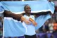 Letsile Tebogo, of Botswana, celebrates after winning the me