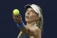 Katie Boulter, of Britain, serves to Aryna Sabalenka, of Bel