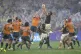 South Africa's Ruan Nortje (centre right) out jumps Australi