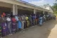 People queue for food at a World Food Programme distribution