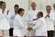 Colombia's President Juan Manuel Santos (front left) and the