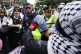 Demonstrators clash with police near the Israeli Consulate d