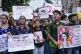 Engineers and engineering students attend a protest against 