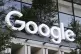 A Google sign hangs over an entrance to the company's new bu