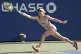 Harriet Dart, of Britain, returns a shot to Marta Kostyuk, o