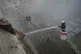 Firefighters put out the fire after the Russia's guided air 