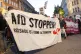 Participants in a demonstration against the right hold a ban