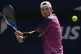 Jack Draper returns a shot to Alex de Minaur during the quar