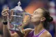 Aryna Sabalenka, of Belarus, kisses the championship trophy 