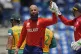 England's Moeen Ali (centre) celebrates with captain Jos But