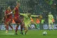 Wales' Harry Wilson (right) duels for the ball with Monteneg